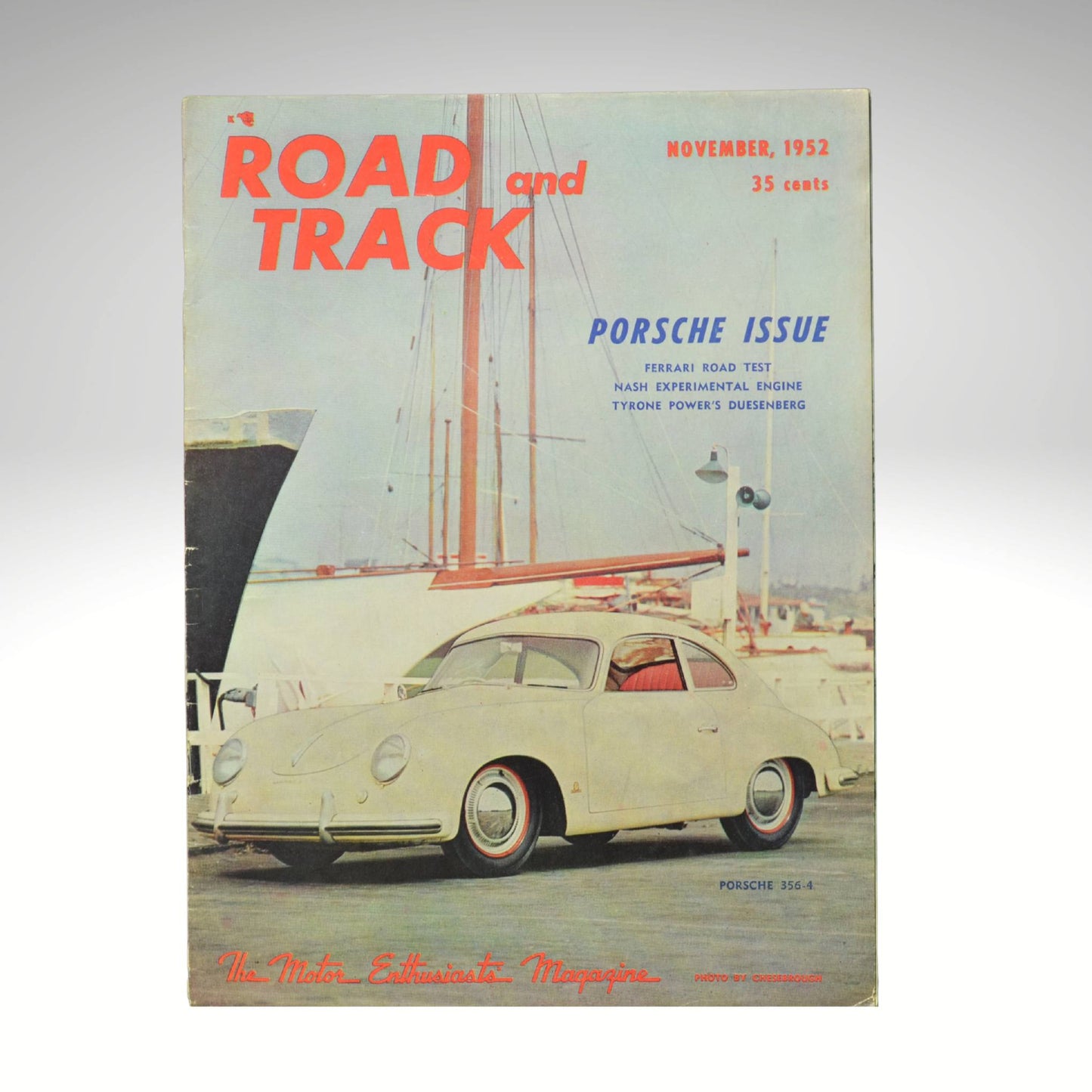Cover of 'Road and Track' magazine featuring a Porsche car, November 1952 issue.
