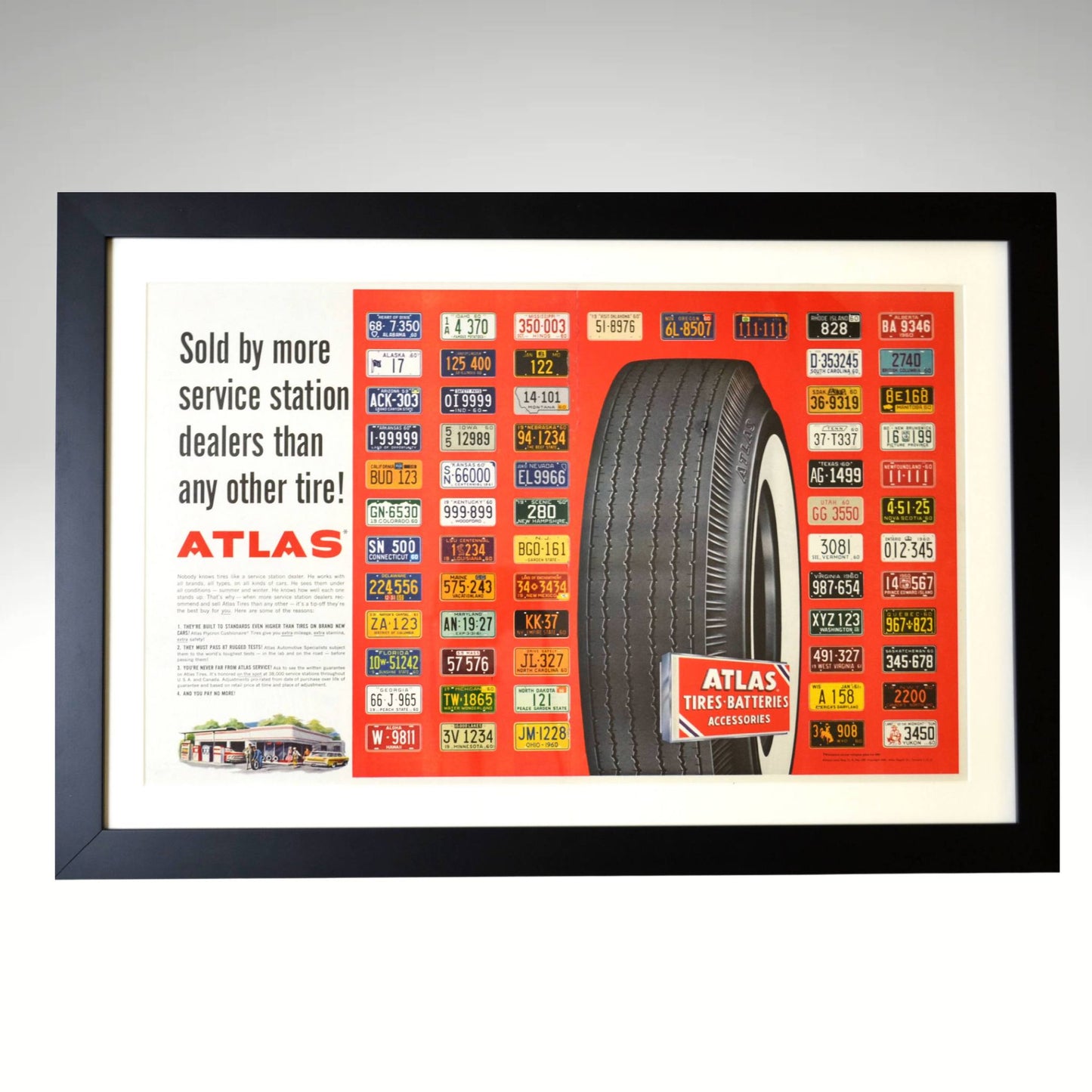 1960 Atlas Tire framed vintage print featuring a bold red background, classic Atlas tire advertisement, and colorful state license plates. This Standard Oil-affiliated petroliana ad is professionally dry-mounted and framed in a black wood frame with a white matte. Ideal for gas station memorabilia collectors and vintage automotive decor enthusiasts.