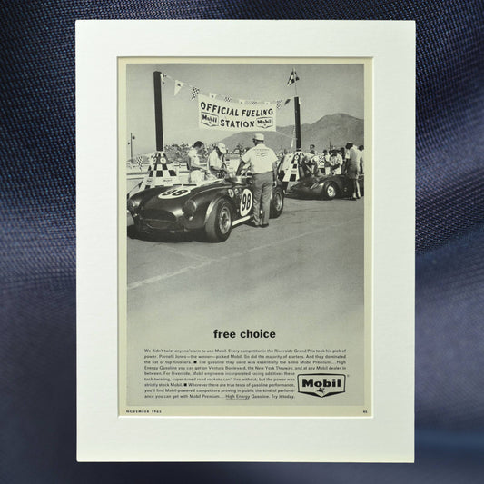 1965 Mobil vintage print ad featuring Shelby Cobra No. 98 at the Riverside Grand Prix fueling station. Driven by Ken Miles, Bob Bondurant, and Parnelli Jones.