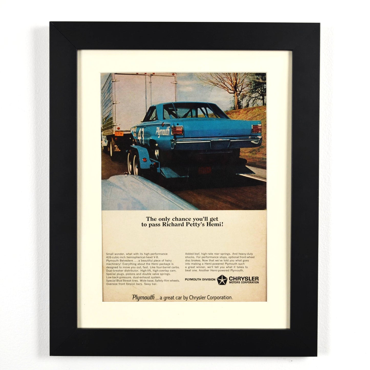 Framed 1966 Richard Petty HEMI Plymouth ad with race trailer – 12x15 vintage print wall art