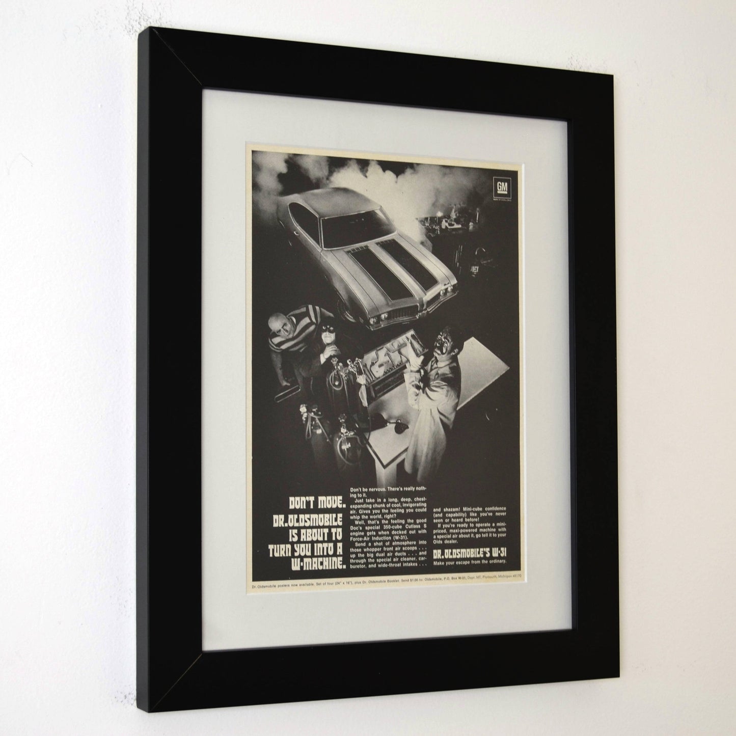 side view Framed 1969 Oldsmobile 442 W-Machine ad print featuring Dr. Oldsmobile – 12x15 vintage automotive wall art