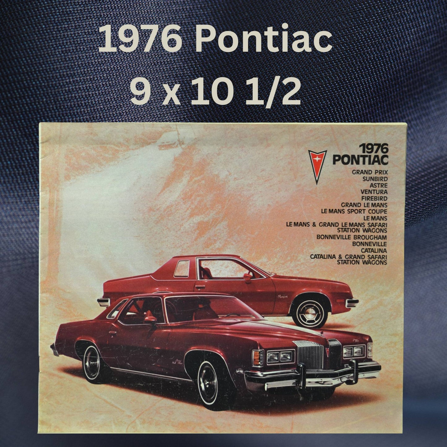 The smaller version of the 1976 Pontiac brochure with the same red Grand Prix and Sunbird on the cover, listing all models included in the brochure