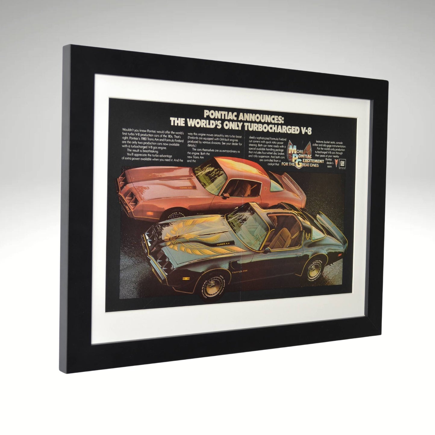 Side view of 1980 Pontiac Firebird Trans Am & Formula framed print ad featuring the Turbo V8 engine, Screaming Chicken hood decal, and Pontiac muscle car styling.