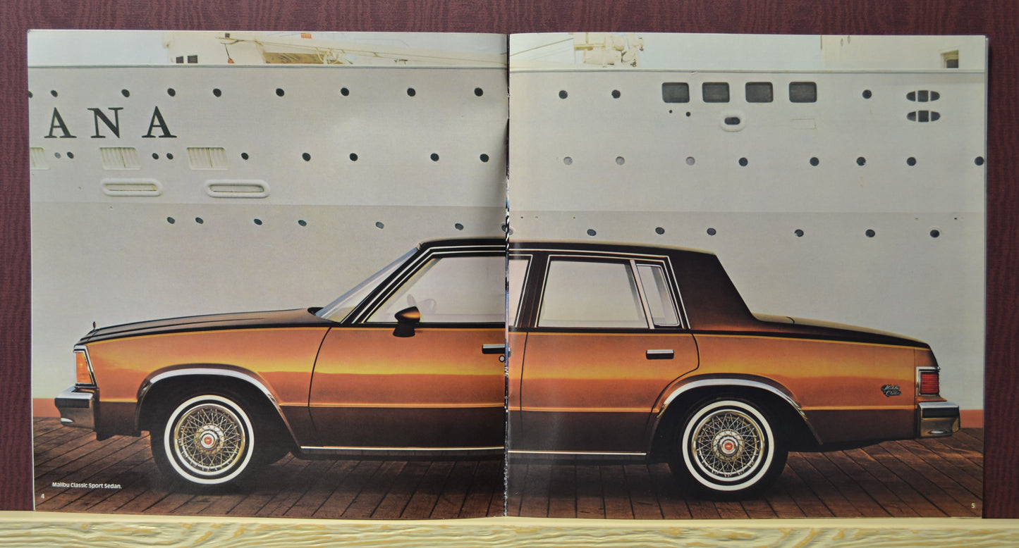 interior pages 1981 Chevy Malibu sport sedan brochure showing car on shipyard dock