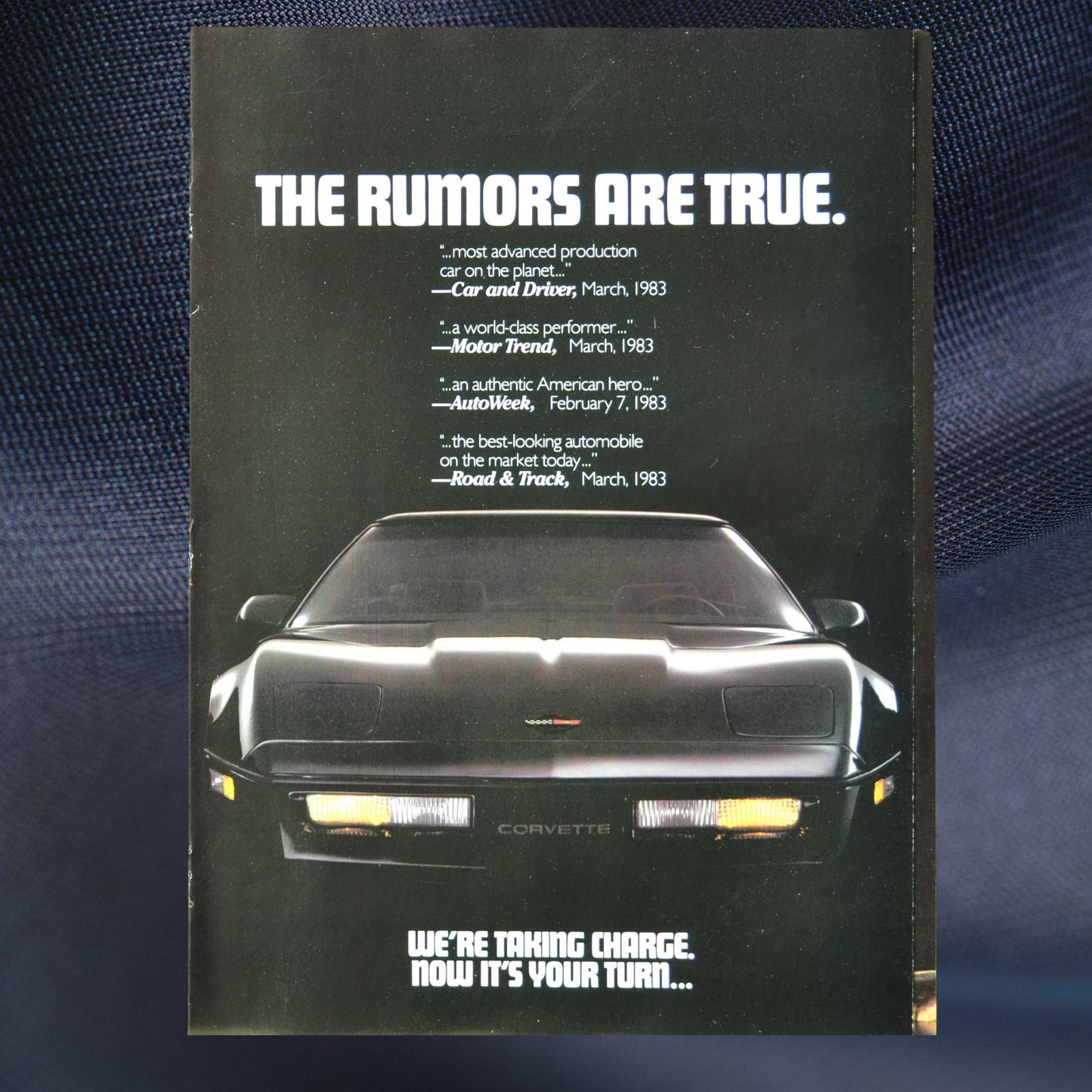 1984 Corvette ad cover – “The Rumors Are True” headline with blacked-out C4 front view