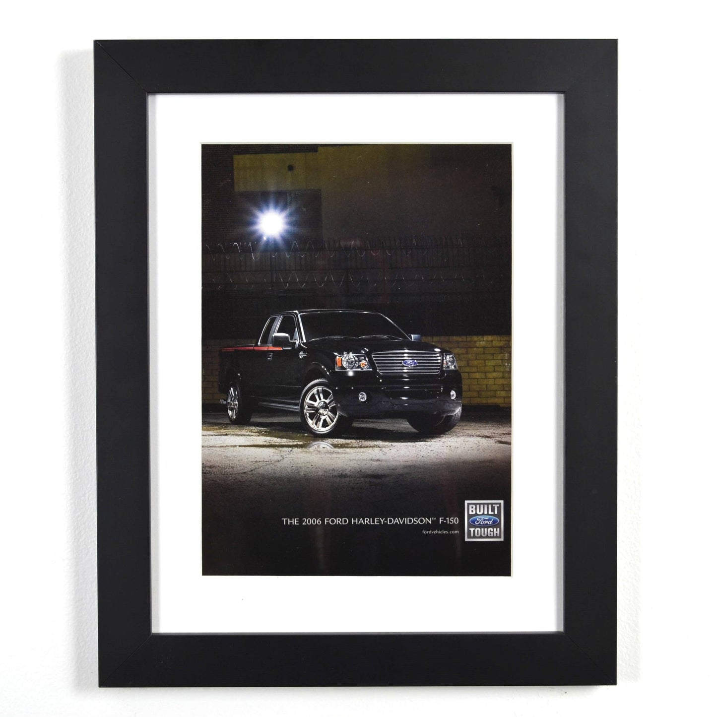 Framed 2006 Ford Harley-Davidson F-150 ad with black truck at night – 12x15 vintage print
