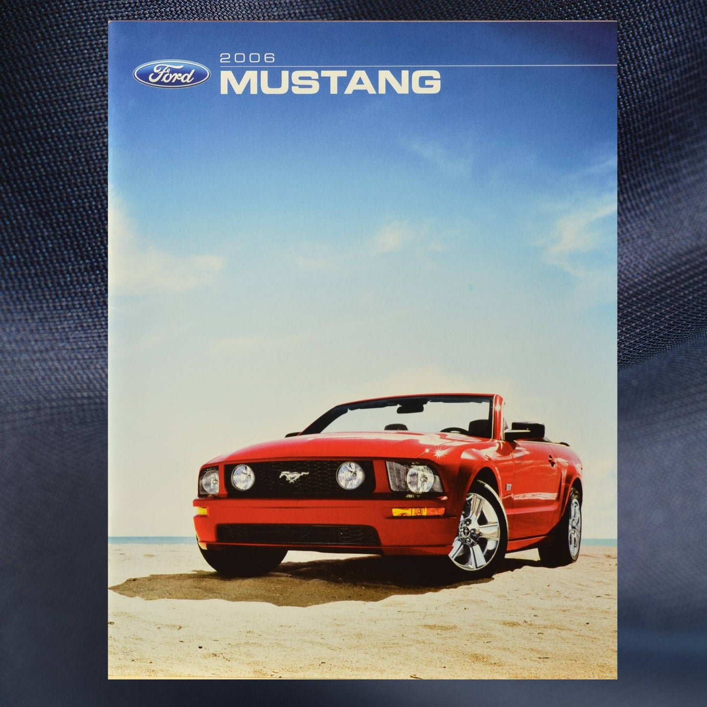 2006 Ford Mustang brochure cover with red convertible