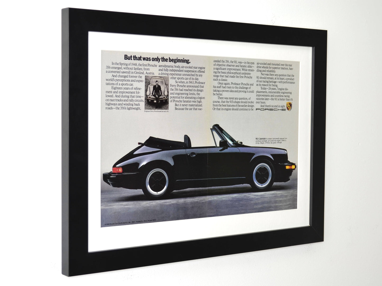 Framed 1986 black Porsche 911 Cabriolet print ad – vintage air-cooled Porsche artwork side view