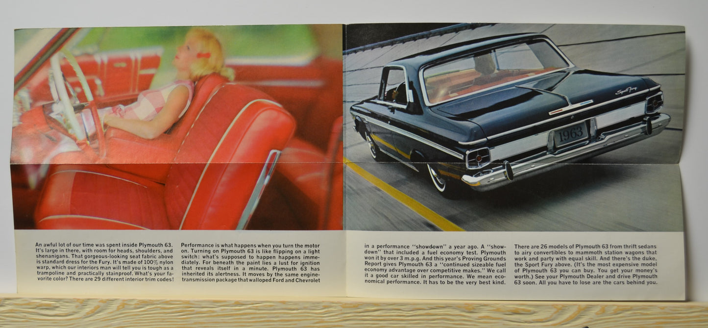 Rear view of 1963 Plymouth Sport Fury on track
