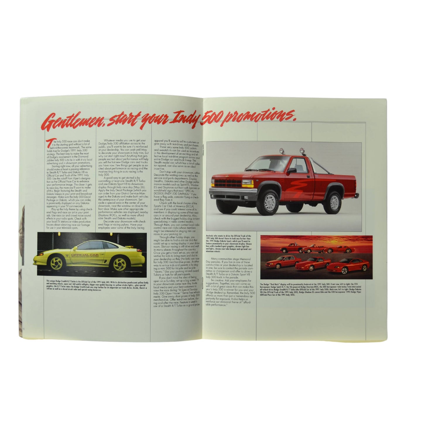 Interior pages showcasing the Dodge Dakota V8 and promotional vehicles for the 1991 Indy 500.