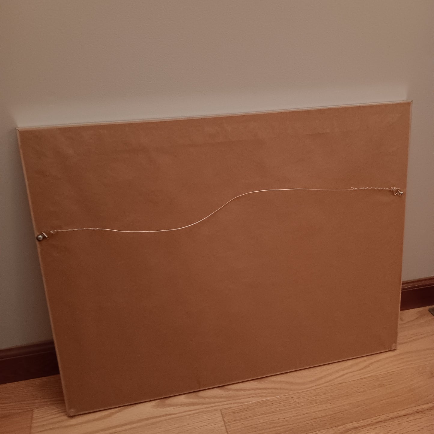 framed art backside, dust cover and hanging hardware