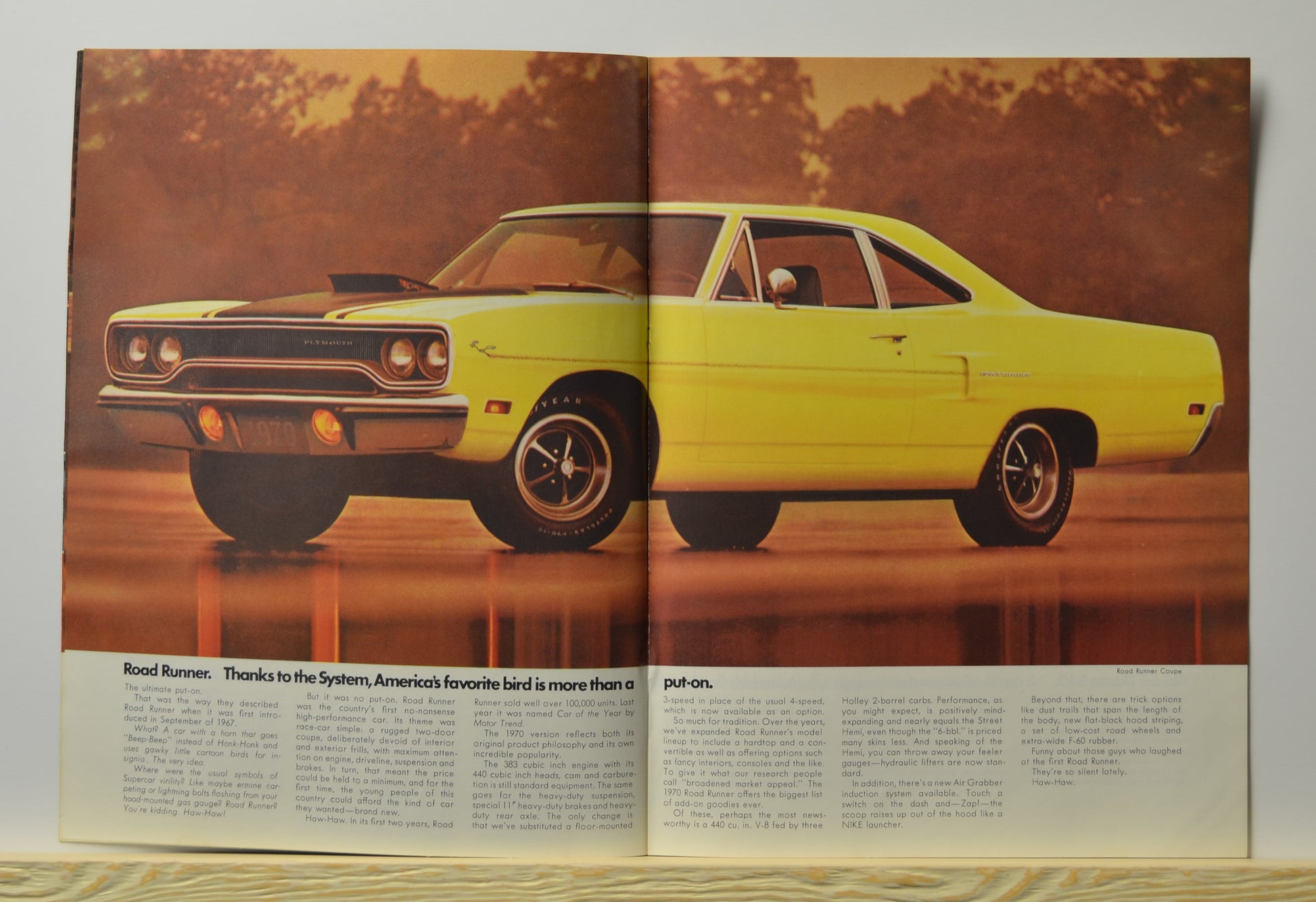 1970 Plymouth Road Runner in bright yellow with black hood scoop
