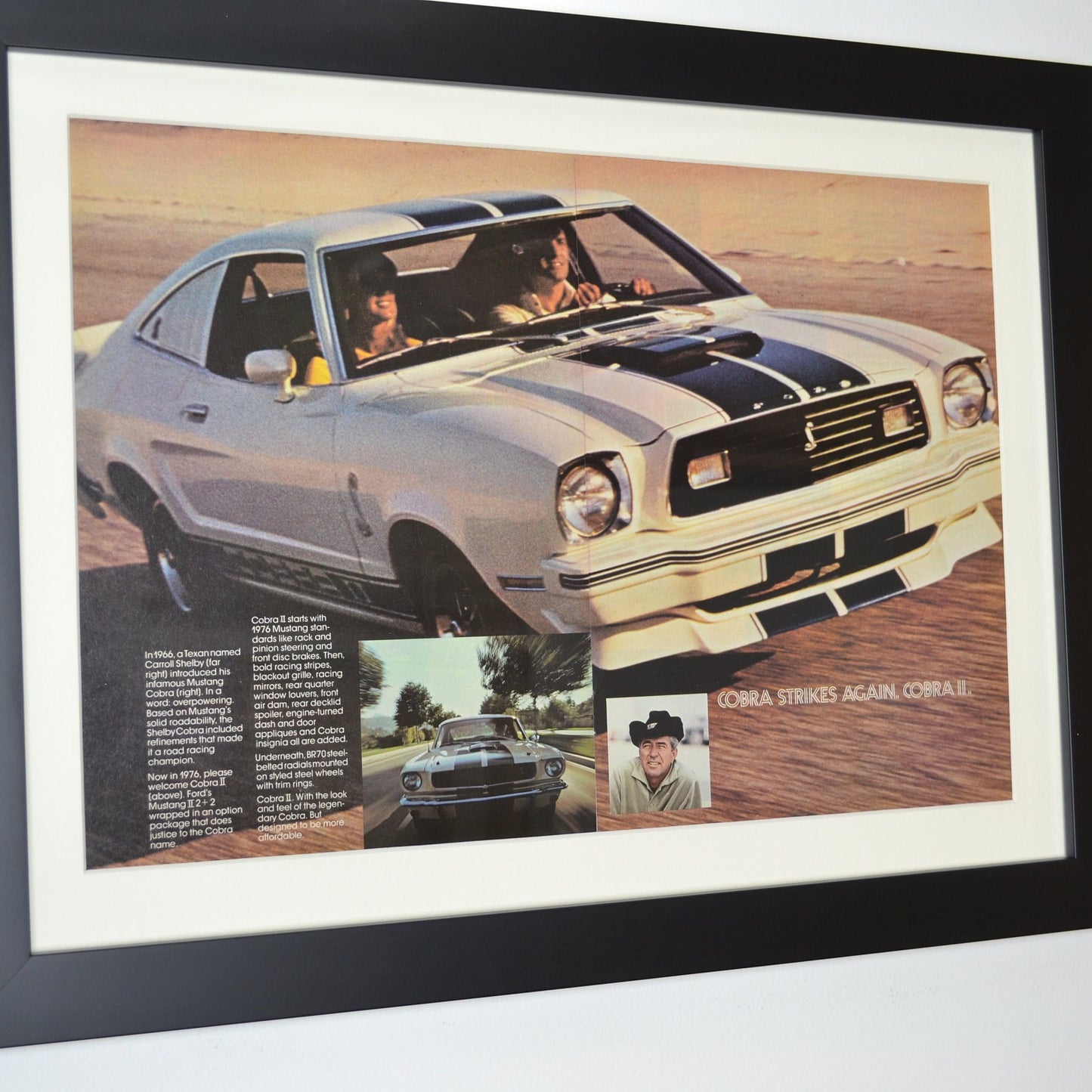 1976 Ford Mustang Cobra II framed print showcasing Shelby-inspired styling, racing stripes, and classic Mustang performance side view