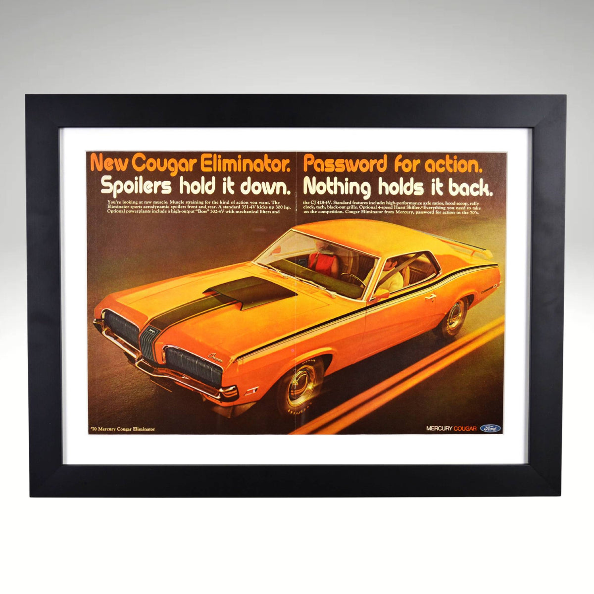 Framed vintage 1970 Mercury Cougar Eliminator advertisement featuring an orange muscle car with black racing stripes. A must-have for Mercury enthusiasts and collectors.