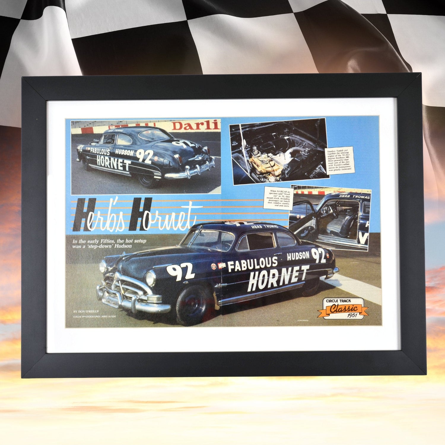 Framed vintage Hudson Hornet NASCAR advertisement featuring Herb Thomas’ 1951 race-winning stock car. A classic tribute to NASCAR’s early champions.