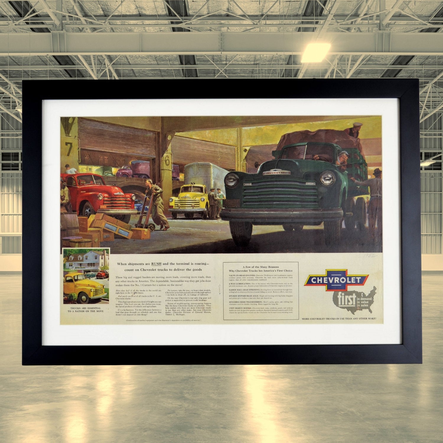 Framed vintage 1952 Chevrolet truck advertisement featuring classic Chevy pickup trucks at a bustling loading dock. Perfect automotive wall art for collectors and truck enthusiasts.