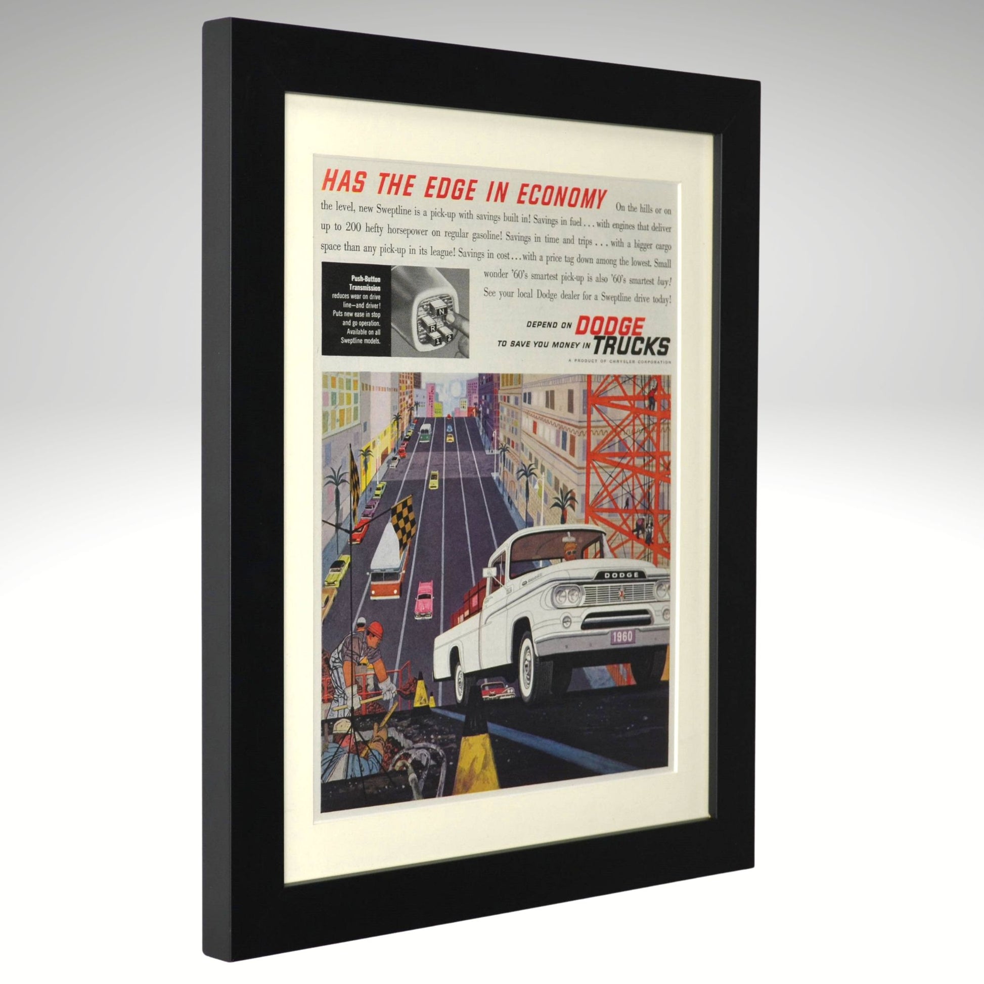 Framed vintage advertisement for Dodge Trucks on a gray background