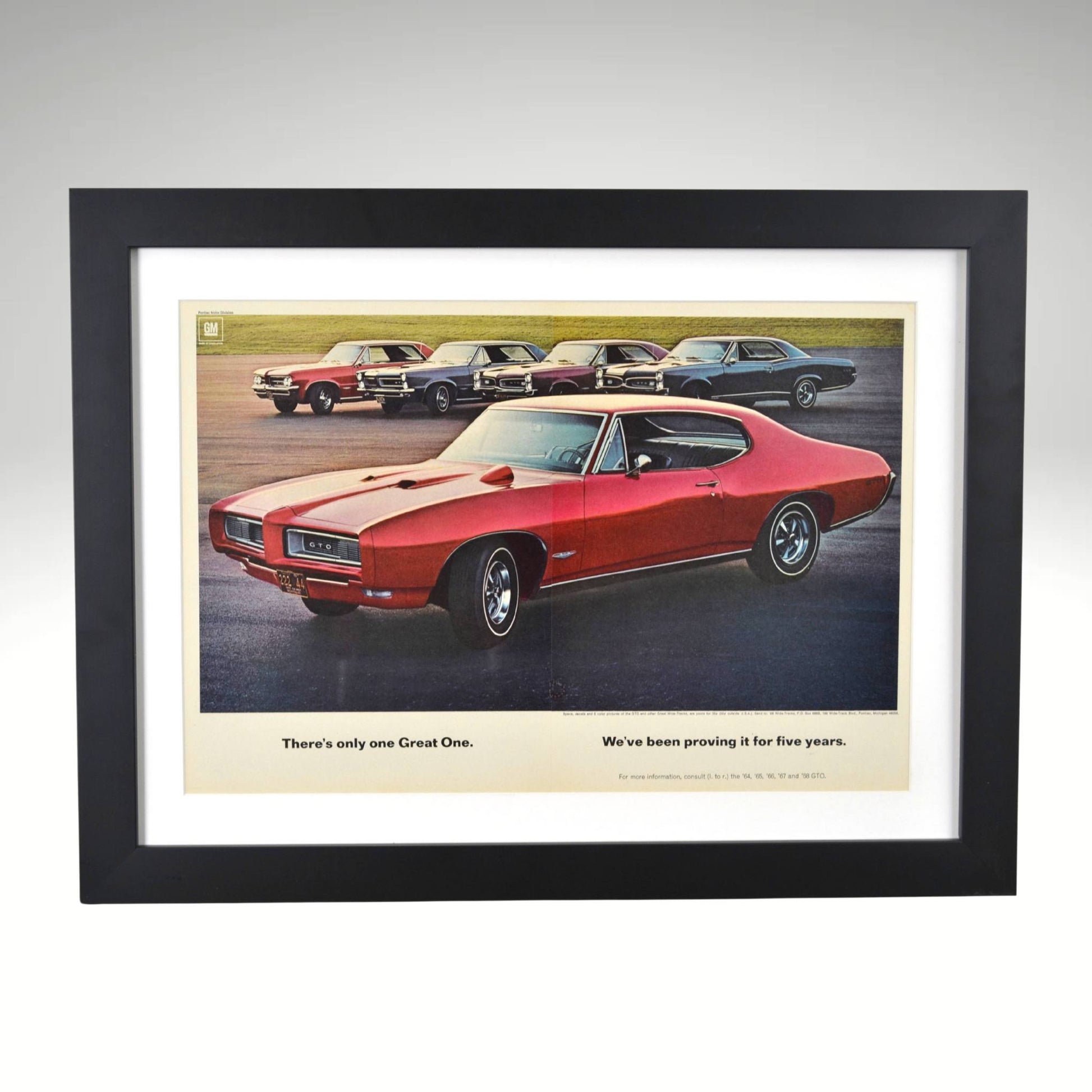 Framed 1968 Pontiac GTO ad featuring 1964–1968 lineup and “Great One” slogan

