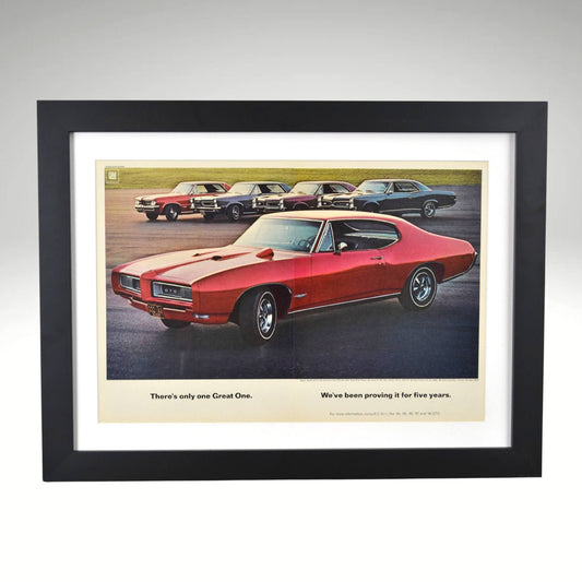 Framed 1968 Pontiac GTO ad featuring 1964–1968 lineup and “Great One” slogan


