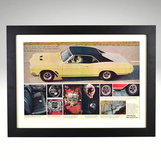 Framed 1966 Buick Skylark GS vintage print ad, professionally dry mounted and displayed in a 15x20 matte black frame. Features a classic Buick muscle car with performance details, ready for wall display