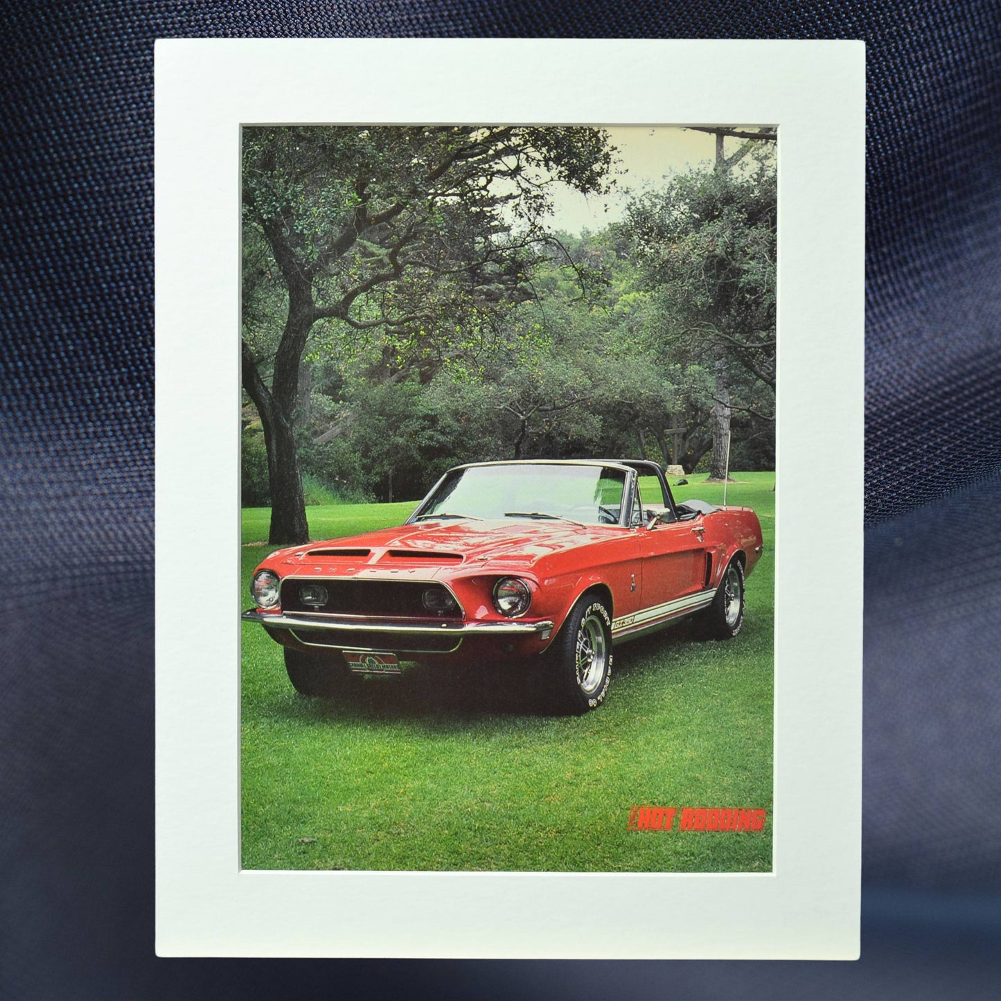 1968 Shelby GT-350 Convertible vintage print, featuring the red Shelby Mustang in a scenic setting, perfect for collectors and classic car enthusiasts.

