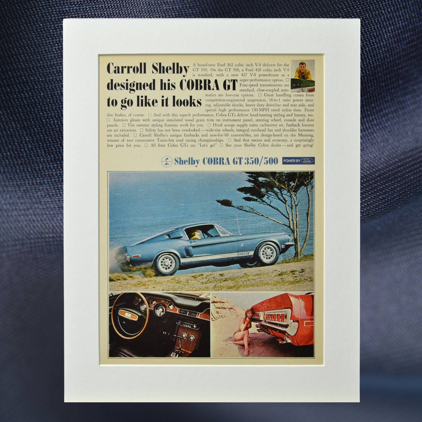 1968 Shelby Cobra GT-350/500 vintage print ad, featuring the blue fastback Shelby Mustang on a scenic coastal road, perfect for collectors and classic car enthusiasts.