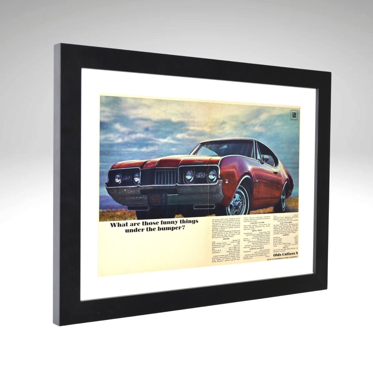 Side view of Framed vintage print of the 1968 Oldsmobile Cutlass S, showcasing its forced air induction system under the bumper, sleek design, and bold performance styling.