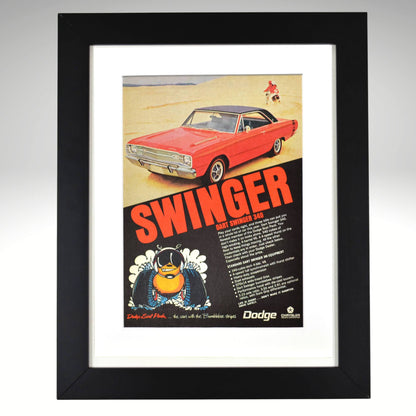 Framed 1969 Dodge Dart Swinger 340 vintage print ad featuring a red Swinger on a beach with bold “SWINGER” headline and Scat Pack bumblebee logo—authentic Mopar wall art for collectors.