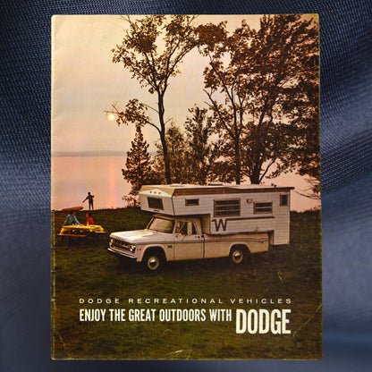 1969 Dodge RV brochure front cover with D-Series camper at sunset