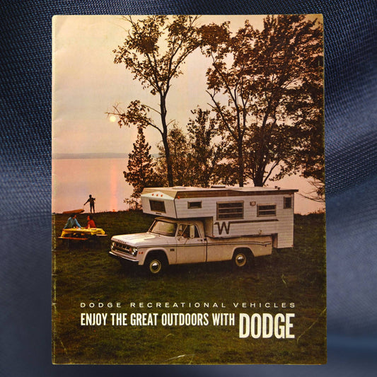 1969 Dodge RV brochure front cover with D-Series camper at sunset