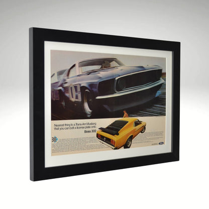 Side view of Framed 1969 Ford Boss 302 Mustang print ad highlighting Ford’s Trans-Am racing connection and the iconic muscle car’s street and track performance.