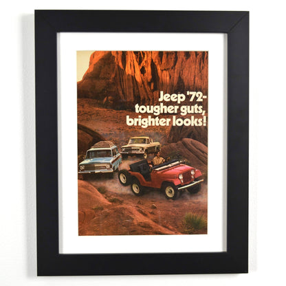 Framed 1972 Jeep vintage print ad featuring a Jeep CJ, Wagoneer, and Jeep Gladiator driving through rugged terrain. Perfect retro car poster for collectors and Jeep enthusiasts.