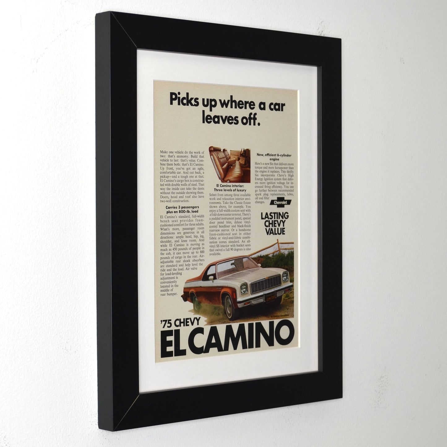 Framed advertisement for 1975 Chevy El Camino on a white background