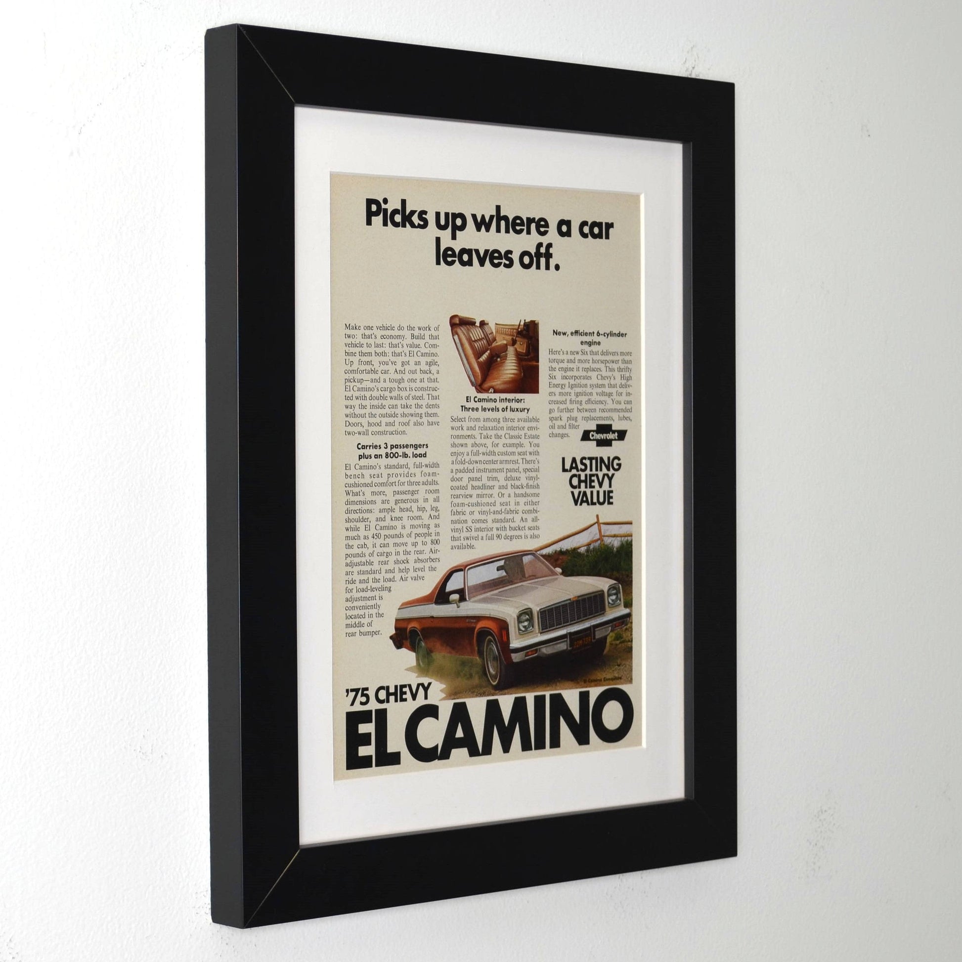 Framed advertisement for 1975 Chevy El Camino on a white background