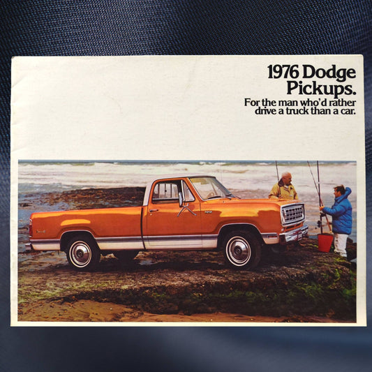 Cover of 1976 Dodge Pickups brochure featuring orange D100