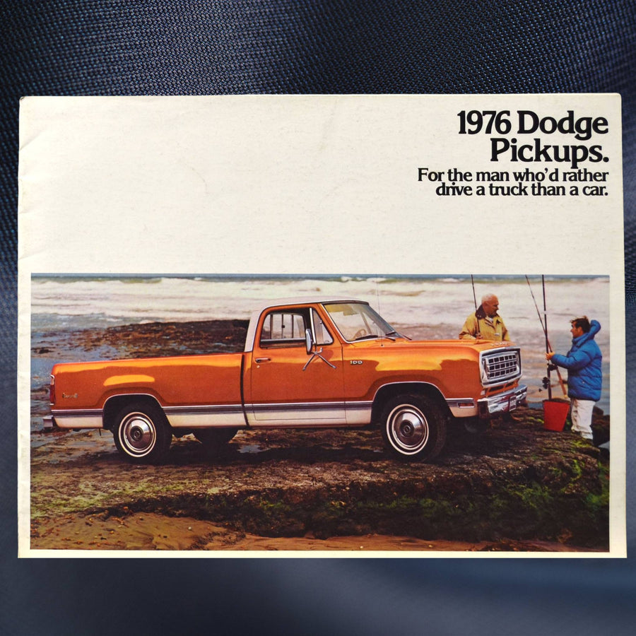 Cover of 1976 Dodge Pickups brochure featuring orange D100