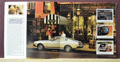 Interior spread of the 1977 Toyota Celica brochure featuring a silver Celica GT Liftback with detailed specifications and close-up images of its tires, and interior