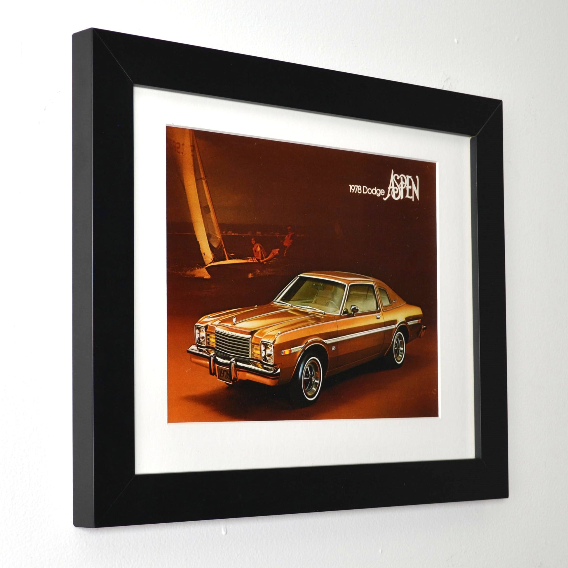 Framed artwork of a classic car with '1978 Dodge Aspen' text on a white background