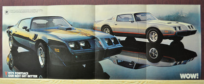 Opened spread featuring black Trans Am and silver Formula