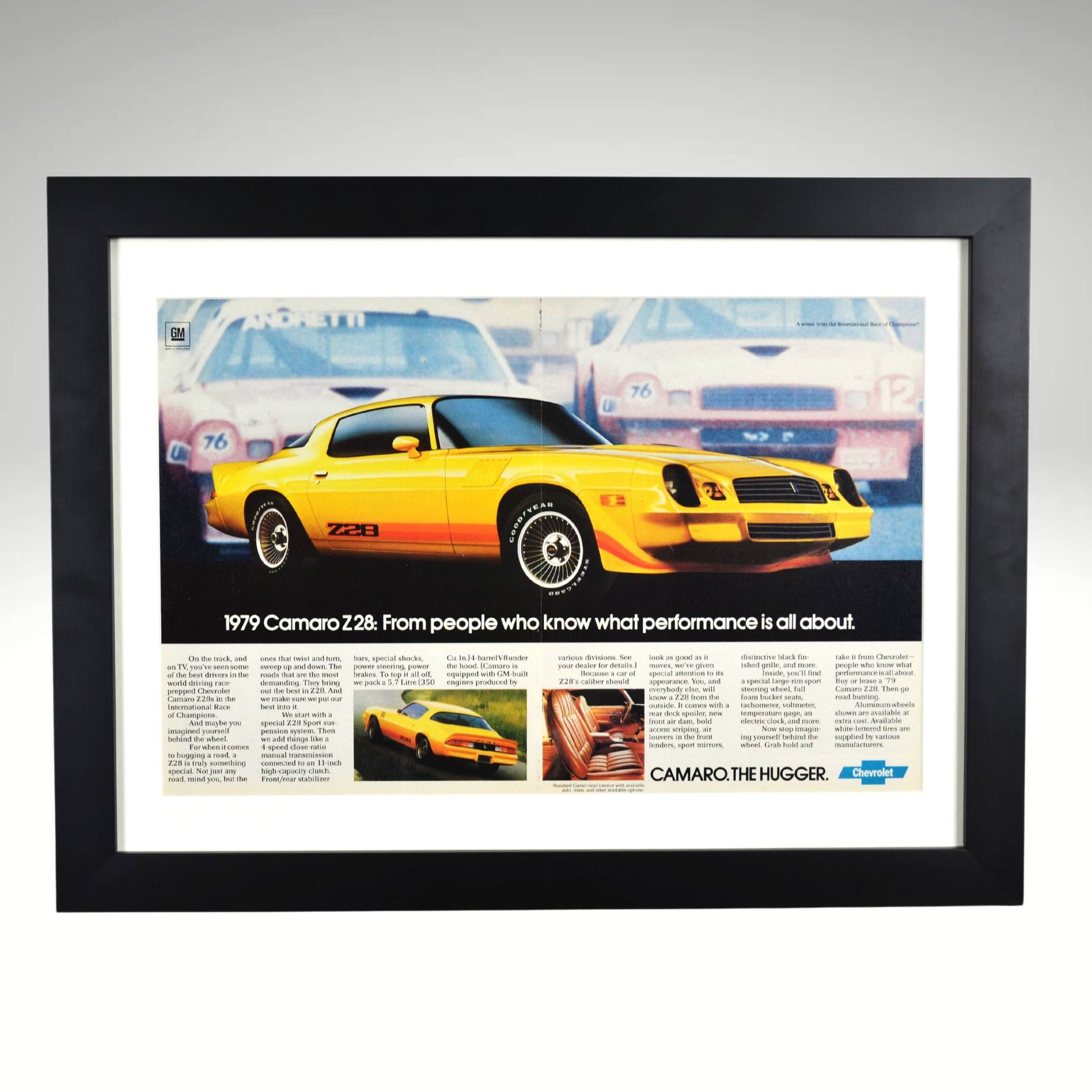 1979 Chevy Camaro Z28 framed vintage print ad featuring classic second-gen muscle car styling, bold graphics, and high-performance Chevy heritage.