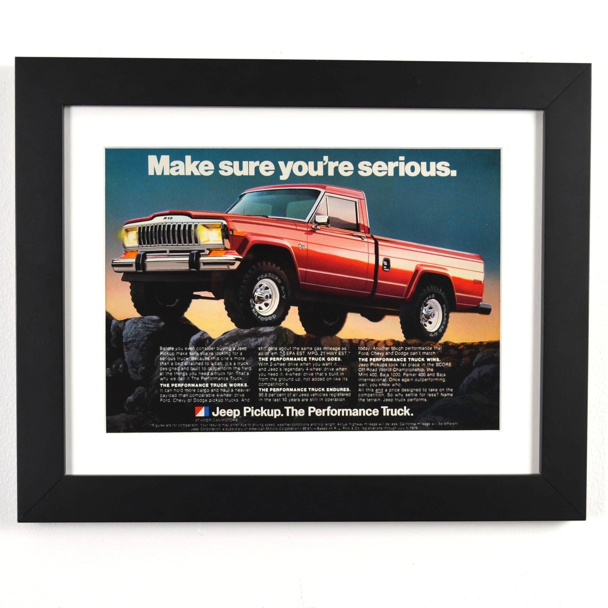 Framed 1979 Jeep Pickup truck print ad with red 4x4 on rocks – vintage Jeep wall art with new frame, mat, and glass