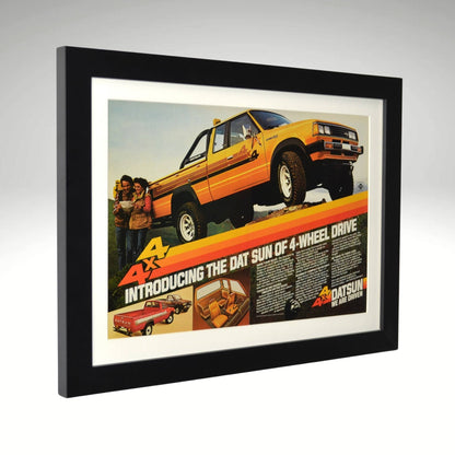 side view of yellow 1980 Datsun 4x4 framed print ad featuring Nissan’s first factory 4-wheel-drive pickup, with bold graphics and a rugged off-road stance.