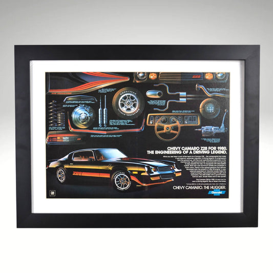 1980 Chevy Camaro Z28 framed vintage print ad featuring technical breakdowns of performance, handling, and classic muscle car styling.