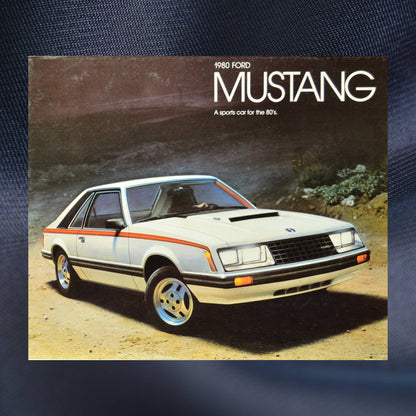 Front cover of the 1980 Ford Mustang dealer brochure featuring a white Mustang Cobra, part of the John Barnes Collection