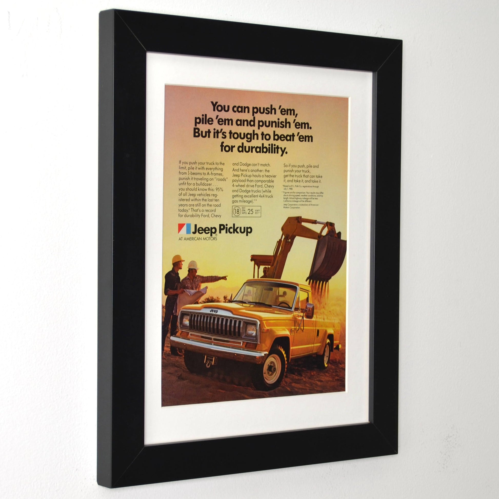 Framed 1980 Jeep Pickup print ad with yellow truck and construction site – vintage Jeep wall art with new frame, mat, and glass side view