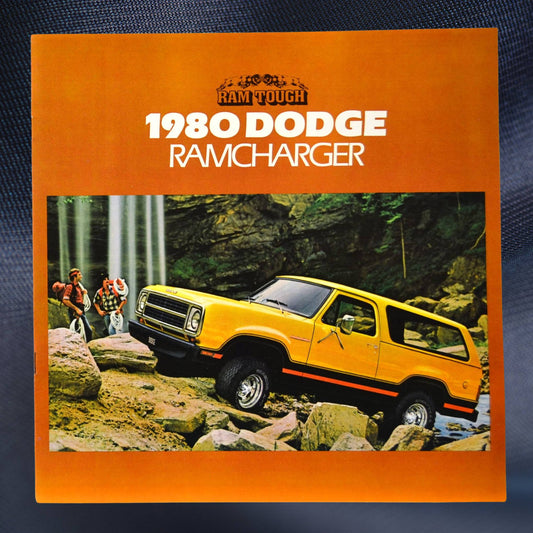 Cover of 1980 Dodge Ramcharger brochure featuring yellow SUV on rocky trail