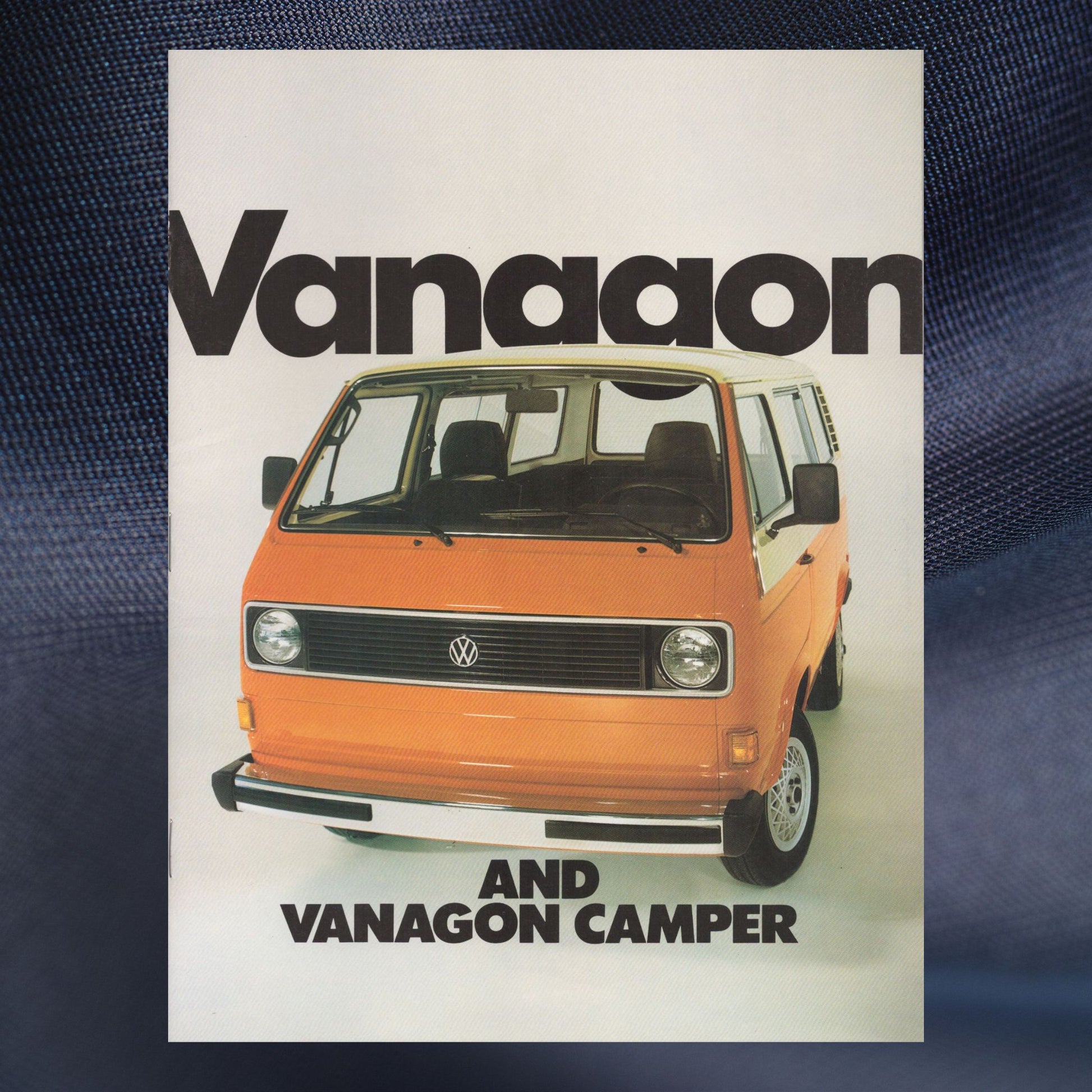 Advertisement for 1982 Volkswagen Vanagon and Vanagon Camper with an orange van on a white background.