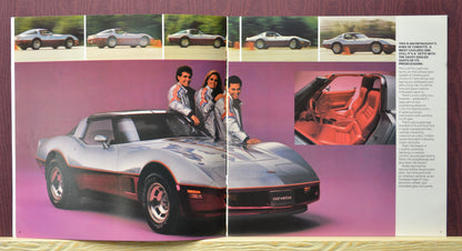 Silver 1982 Chevrolet Corvette in motion with red leather interior and sleek design details."