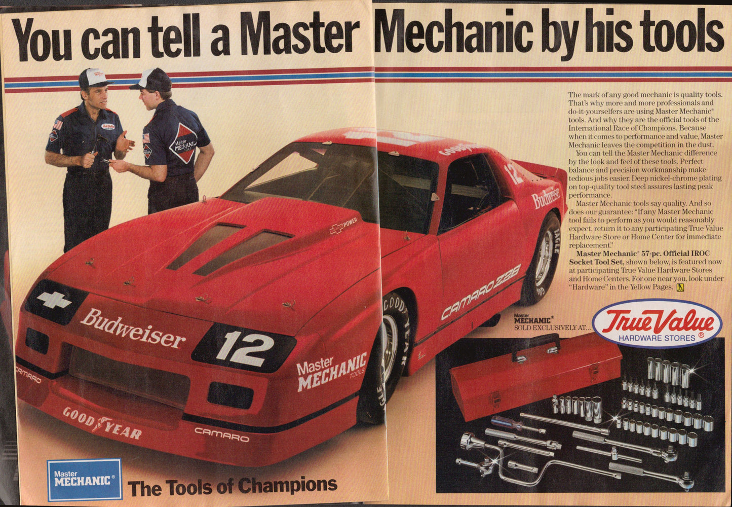 Advertisement featuring a red car with 'Budweiser' and 'Master Mechanic' branding, alongside two mechanics and tool set.