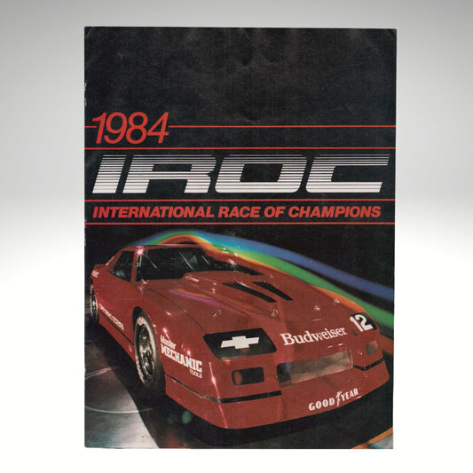 1984 IROC International Race of Champions event poster with a red race car.